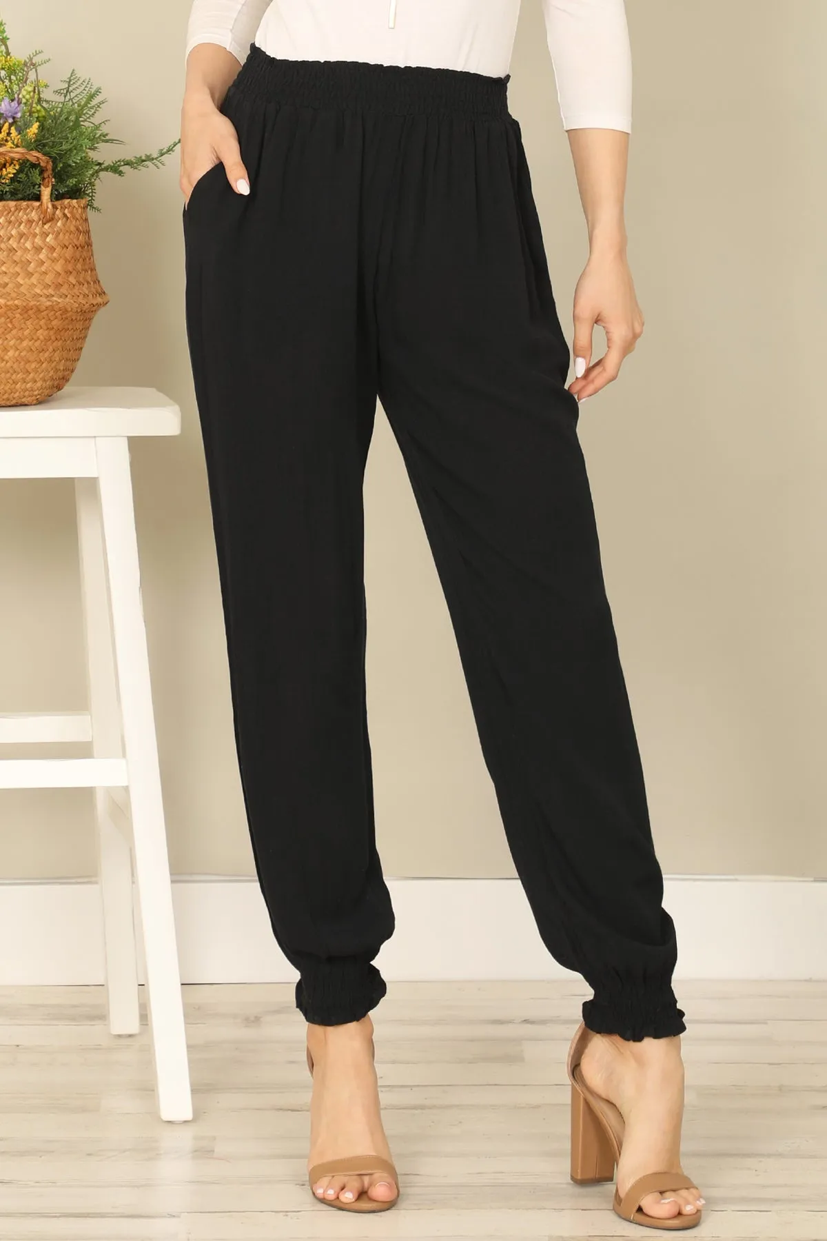 SMOCKED WAIST AND BOTTOM HEM SIDE POCKET SOLID PANTS