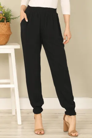 SMOCKED WAIST AND BOTTOM HEM SIDE POCKET SOLID PANTS